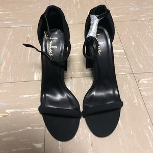 Black size 9 wedge heels, never worn